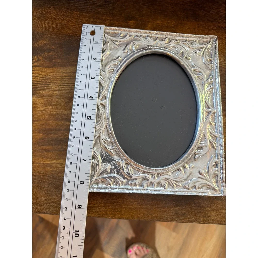 Vintage Ornate Silver Embossed Picture Frame Oval Opening Scrollwork Tabletop